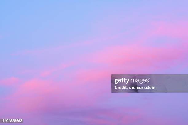 pink and purple colour clouds at sunset - purple sky stock pictures, royalty-free photos & images