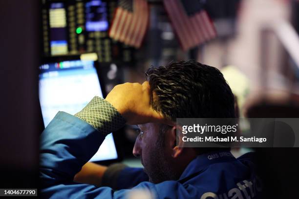 Traders work on the floor of the New York Stock Exchange during morning trading on June 23, 2022 in New York City. Stocks opened on a positive note...