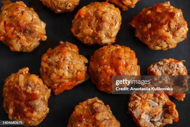 meatballs in tomato sauce. close-up of meatballs. - meatball stock pictures, royalty-free photos & images