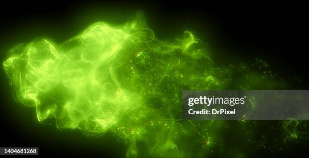 green nebula and shiny dust particles and fog over black background with copy space - magic light stock pictures, royalty-free photos & images