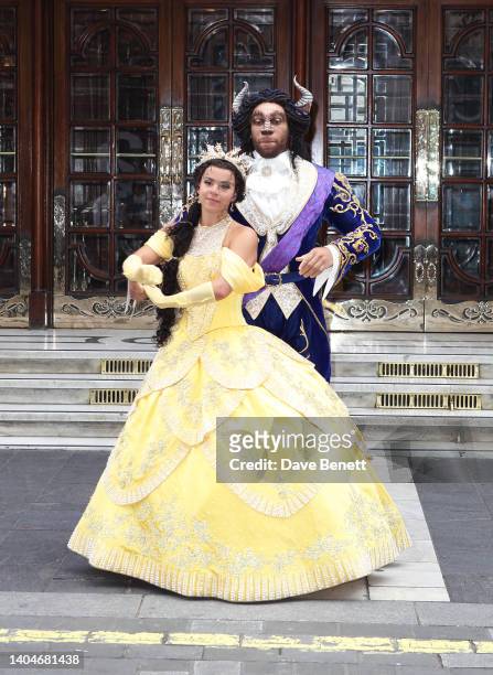 Courtney Stapleton and Shaq Taylor attens a photocall for Disney's "Beauty And The Beast: The Musical" at the London Palladium on June 23, 2022 in...