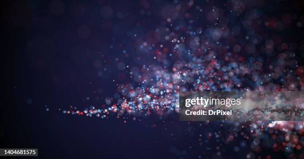 blue purple defocused particles with copy space - particle stock-fotos und bilder