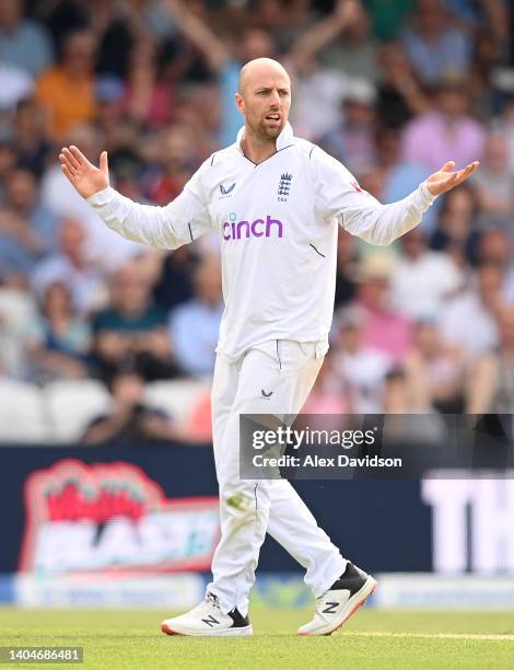 Jack Leach of England reacts after taking the wicket of Henry Nicholls of New Zealand as it came off the bat of New Zealand's Daryl Mitchell at the...