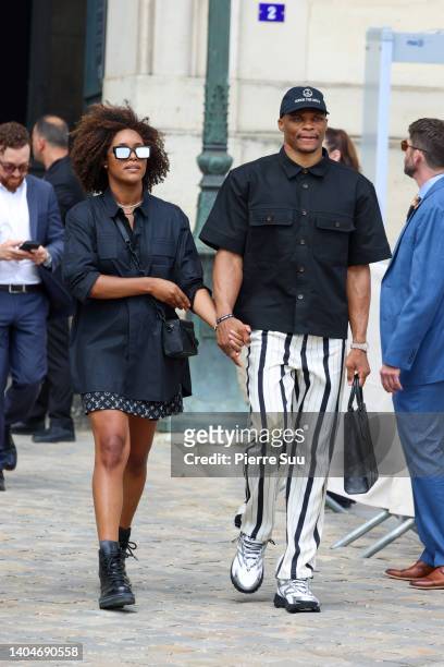 Russell Westbrook and Nina Westbrook attend the Louis Vuitton Menswear Spring Summer 2023 show as part of Paris Fashion Week on June 23, 2022 in...