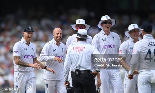 England bowler Jack Leach and Ben Stokes look on in surprise after Leach had taken the wicket of Henry Nicholls, caught by Lees via the bat of Daryl...