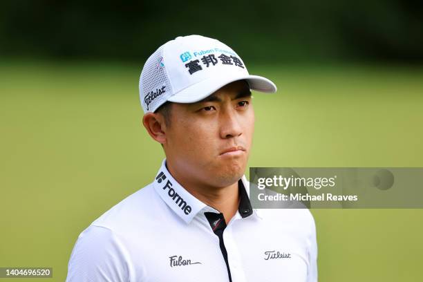 Pan of Chinese Taipei walks along the course during the first round of Travelers Championship at TPC River Highlands on June 23, 2022 in Cromwell,...