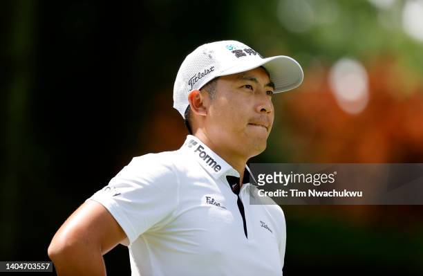 Pan of Chinese Taipei walks along the course during the first round of Travelers Championship at TPC River Highlands on June 23, 2022 in Cromwell,...
