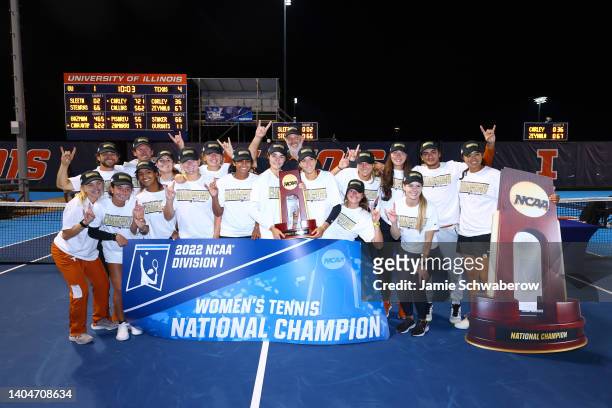 The Texas Longhorns celebrate after defeating the Oklahoma Sooners during the Division I Women's Tennis Championship held at the Atkins Tennis Center...