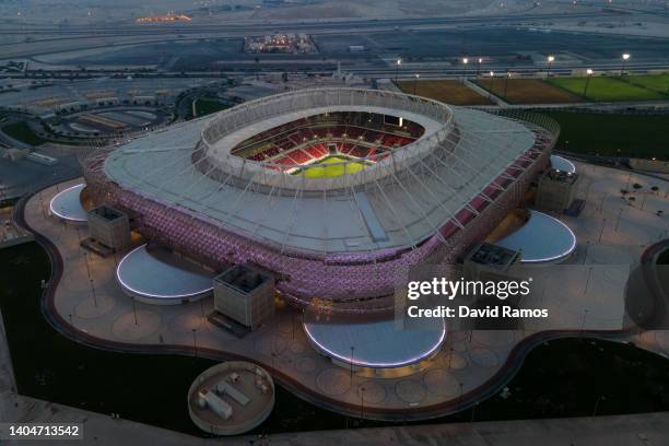 An aerial view of Ahmad Bin Ali stadium at sunset on June 23, 2022 in Al Rayyan, Qatar. Ahmad Bin Ali stadium, designed by Pattern Design studio is a...