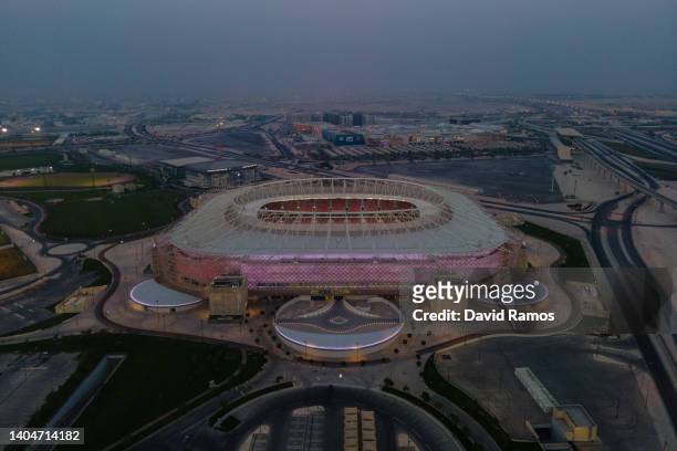 An aerial view of Ahmad Bin Ali stadium at sunset on June 23, 2022 in Al Rayyan, Qatar. Ahmad Bin Ali stadium, designed by Pattern Design studio is a...