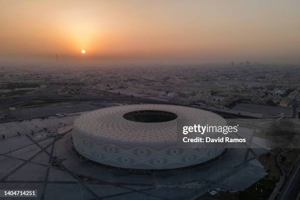 DOHA, QATAR An aerial view of Al Thumama stadium at sunset on June 22, 2022 in Doha, Qatar. Designed by the architect Ibrahim M. Jaidah, the...