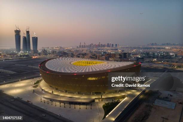 An aerial view of Lusail Stadium at sunrise on June 20, 2022 in Doha, Qatar. The 80,000-seat stadium, designed by Foster + Partners studio, will host...