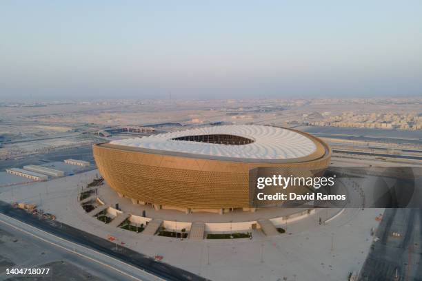 An aerial view of Lusail Stadium at sunrise on June 20, 2022 in Doha, Qatar. The 80,000-seat stadium, designed by Foster + Partners studio, will host...