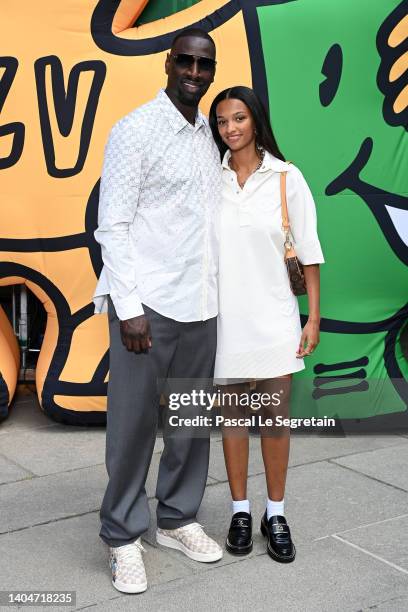 Omar Sy and Selly Sy attend the Louis Vuitton Menswear Spring Summer 2023 show as part of Paris Fashion Week on June 23, 2022 in Paris, France.