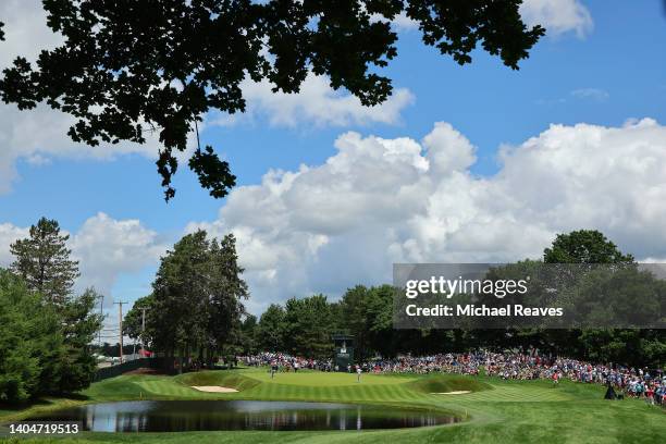 General view of the eighth green as Rory McIlroy of Northern Ireland, Webb Simpson of the United States and Kevin Kisner of the United States look...