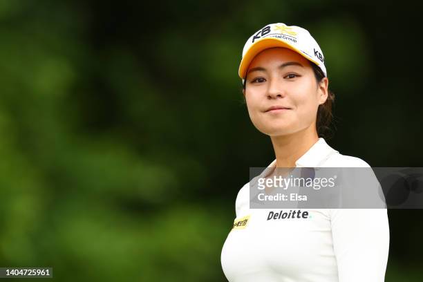 In Gee Chun of South Korea smiles during the first round of the KPMG Women's PGA Championship at Congressional Country Club on June 23, 2022 in...