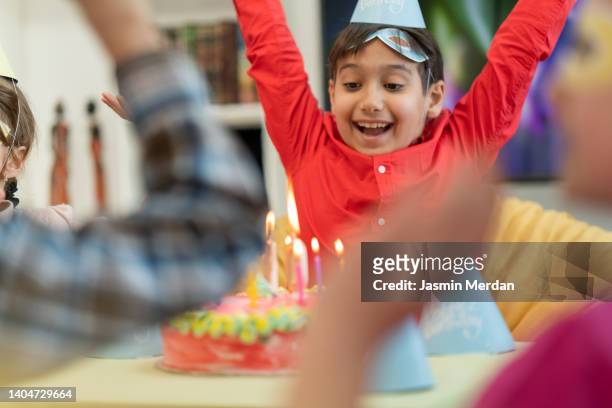 happy kids celebrating birthday - cute muslim boys stock pictures, royalty-free photos & images