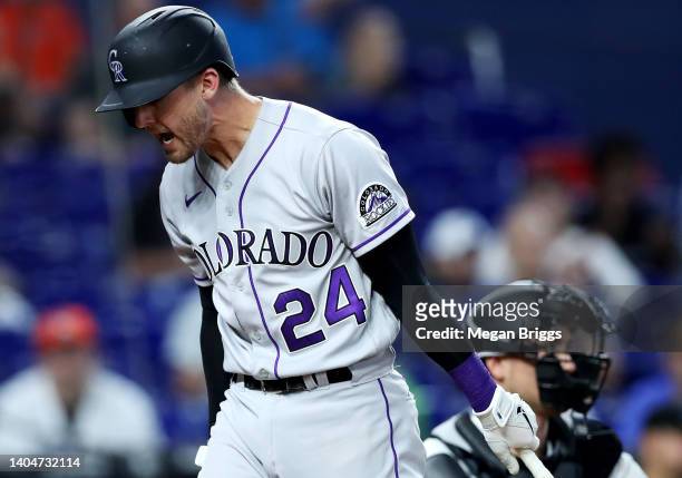 Ryan McMahon of the Colorado Rockies reacts after striking out during the ninth inning against the Miami Marlins at loanDepot park on June 23, 2022...