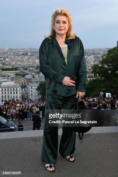Catherine Deneuve attends the AMI - Alexandre Mattiussi Menswear Spring Summer 2023 show as part of Paris Fashion Week on June 23, 2022 in Paris,...