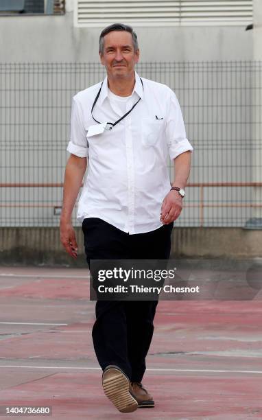 Fashion designer Dries Van Noten walks the runway at the end of the Dries Van Noten Menswear Spring Summer 2023 show as part of Paris Fashion Week on...