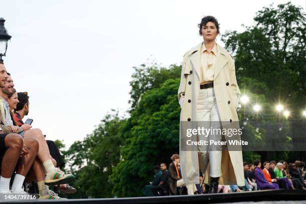 Audrey Tautou walks the runway during the AMI - Alexandre Mattiussi Menswear Spring Summer 2023 show as part of Paris Fashion Week on June 23, 2022...