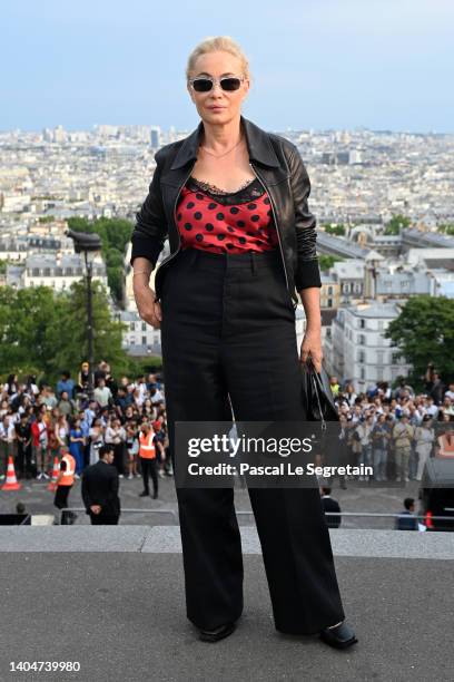 Emmanuelle Beart attends the AMI - Alexandre Mattiussi Menswear Spring Summer 2023 show as part of Paris Fashion Week on June 23, 2022 in Paris,...