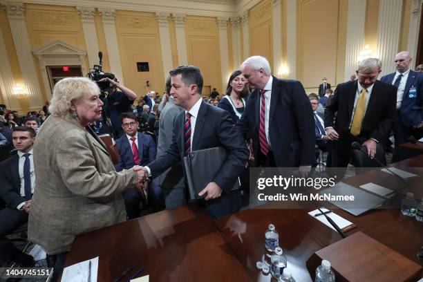 Rep. Zoe Lofgren shakes hands with Steven Engel, former Assistant Attorney General for the Office of Legal Counsel, as he an Jeffrey Rosen, former...