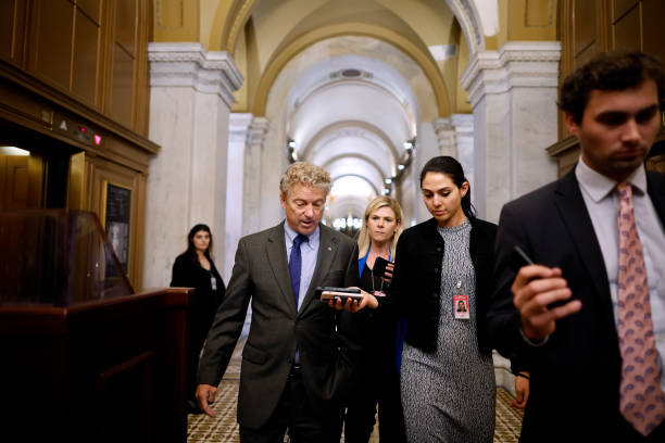 Sen. Rand Paul talks with journalists as he leaves the U.S. Capitol after delivering a speech about the Bipartisan Safer Communities Act on the...
