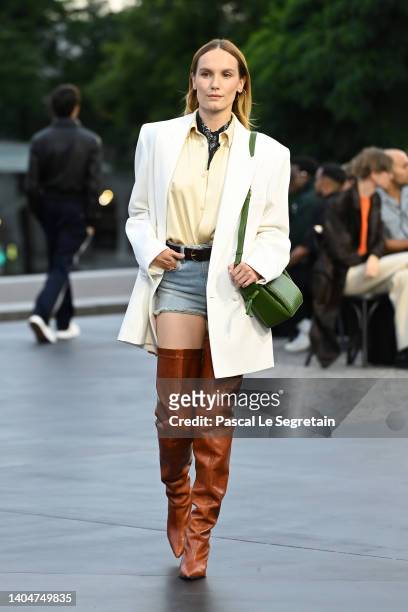Ana Girardot walks the runway during the AMI - Alexandre Mattiussi Menswear Spring Summer 2023 show as part of Paris Fashion Week on June 23, 2022 in...