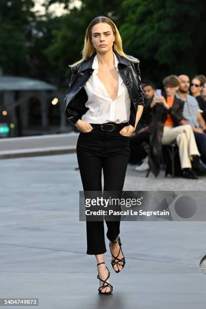 Cara Delevingne walks the runway during the AMI - Alexandre Mattiussi Menswear Spring Summer 2023 show as part of Paris Fashion Week on June 23, 2022...