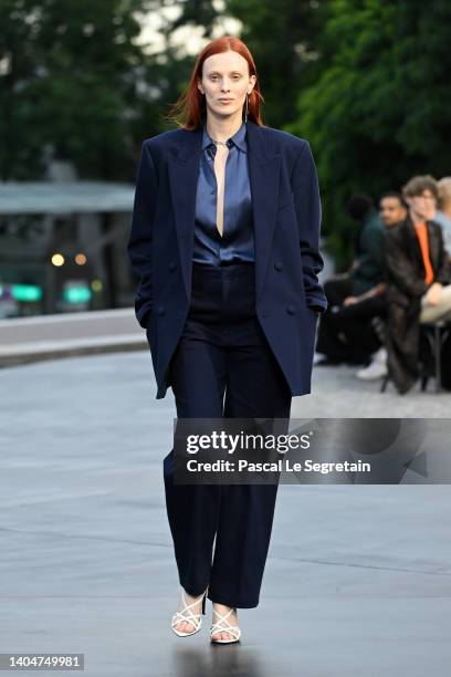 Karen Elson walks the runway during the AMI - Alexandre Mattiussi Menswear Spring Summer 2023 show as part of Paris Fashion Week on June 23, 2022 in...