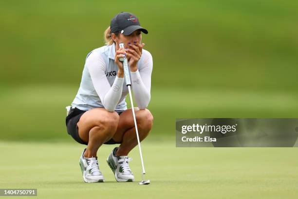 Jaye Marie Green of the United States lines up a putt on the ninth green during the first round of the KPMG Women's PGA Championship at Congressional...