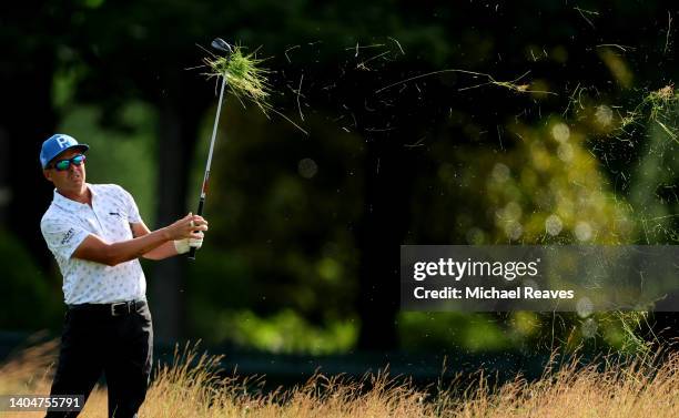 Rickie Fowler of the United States plays a shot on the seventh hole during the first round of Travelers Championship at TPC River Highlands on June...