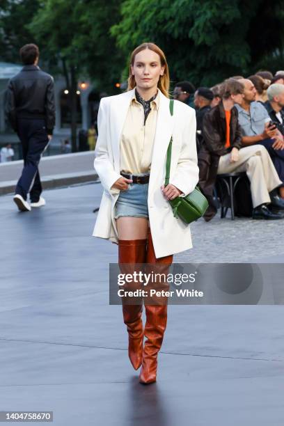 Ana Girardot walks the runway during the AMI - Alexandre Mattiussi Menswear Spring Summer 2023 show as part of Paris Fashion Week on June 23, 2022 in...