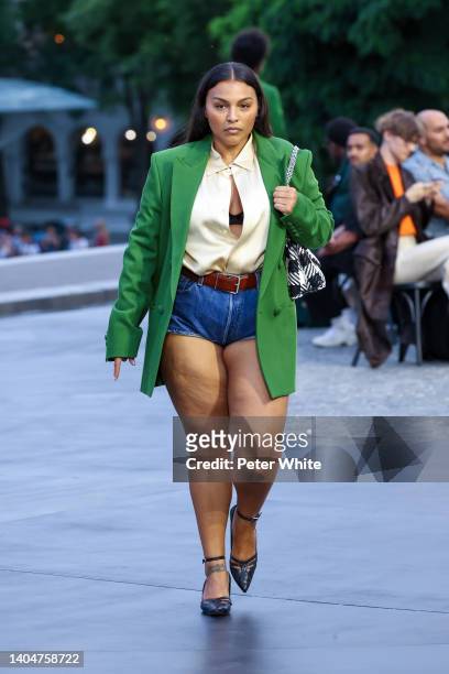 Paloma Elsesser walks the runway during the AMI - Alexandre Mattiussi Menswear Spring Summer 2023 show as part of Paris Fashion Week on June 23, 2022...