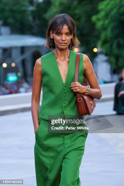 Liya Kebede walks the runway during the AMI - Alexandre Mattiussi Menswear Spring Summer 2023 show as part of Paris Fashion Week on June 23, 2022 in...