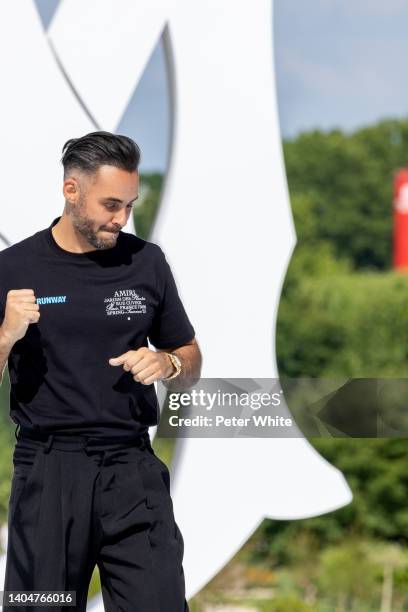 Fashion designer Mike Amiri walks the runway during the Amiri Menswear Spring Summer 2023 show as part of Paris Fashion Week on June 23, 2022 in...