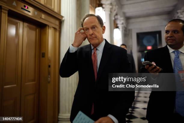 Sen. Pat Toomey heads into the Senate chamber before the passage of the Bipartisan Safer Communities Act at the U.S. Capitol on June 23, 2022 in...