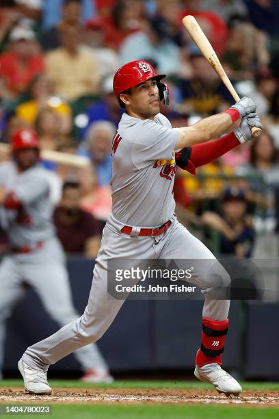 Dylan Carlson of the St. Louis Cardinals swings at a pitch against the Milwaukee Brewers at American Family Field on June 22, 2022 in Milwaukee,...