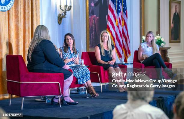 Yorba Linda, CA Sitting on stage, U.S. Olympic gold medalists: Janet Evans, second from left, Courtney Mathewson, and Kerri Walsh Jennings, right,...