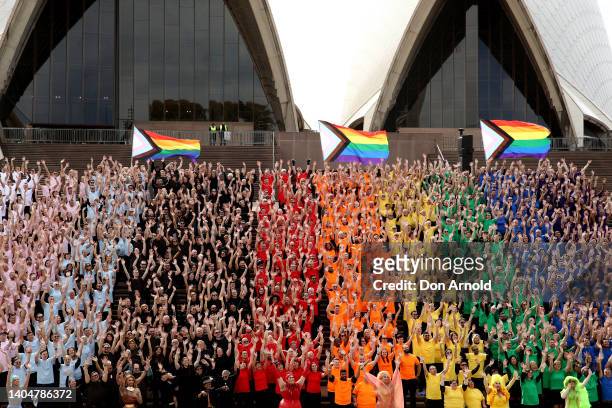 People form a human progress flag on the steps of the Opera House to mark the 44th anniversary or the Sydney Gay and Lesbian Mardis Gras Sydney Opera...