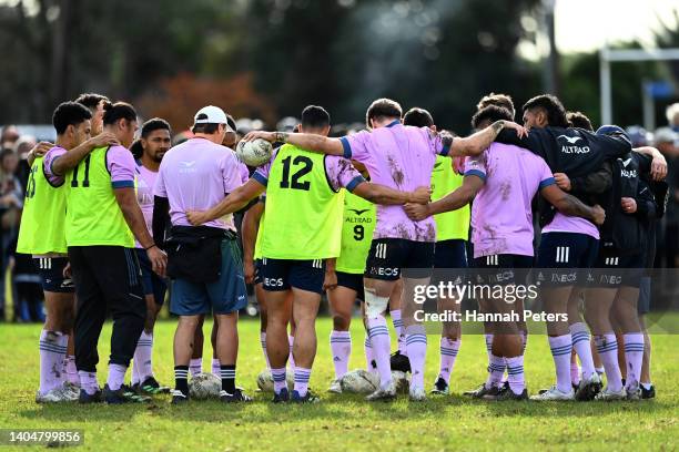 The All Blacks huddle during a training session at Kerikeri Rugby Ground on June 24, 2022 in Kerikeri, New Zealand.