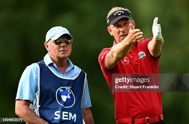 Marcel Siem of Germany and his caddie Kyle Roadley on 11th tee during the second round of the BMW International Open at Golfclub Munchen Eichenried...