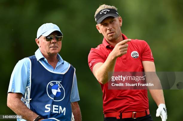 Marcel Siem of Germany and his caddie Kyle Roadley on 11th tee during the second round of the BMW International Open at Golfclub Munchen Eichenried...
