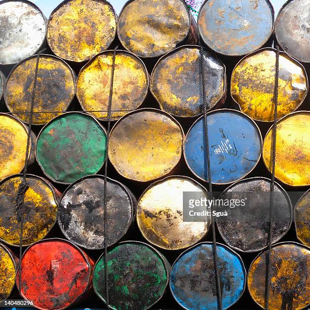 colored oil drums - multi barrel stock pictures, royalty-free photos & images