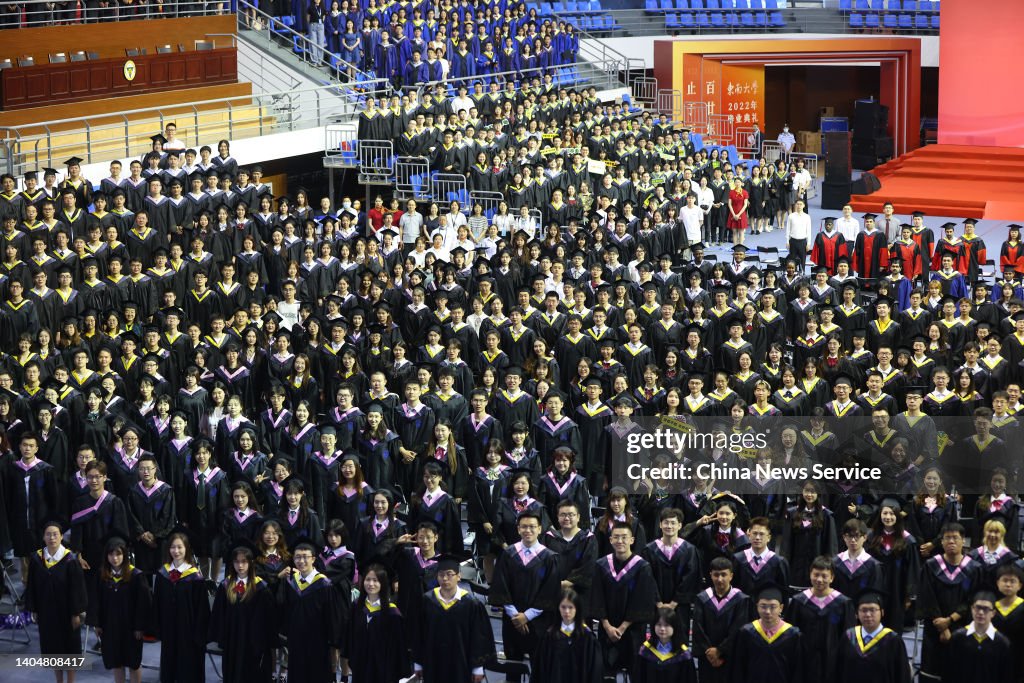 Graduation Gan Graduates pose for a group photo during the graduation ceremony at ...
