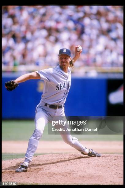 Pitcher Randy Johnson of the Seattle Mariners prepares to throw the ball during a game against the Milwaukee Brewers. The Mariners won the game 4-2....