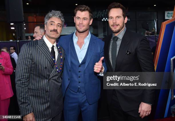 Taika Waititi, Chris Hemsworth and Chris Pratt attend the Thor: Love and Thunder World Premiere at the El Capitan Theatre in [Hollywood], California...