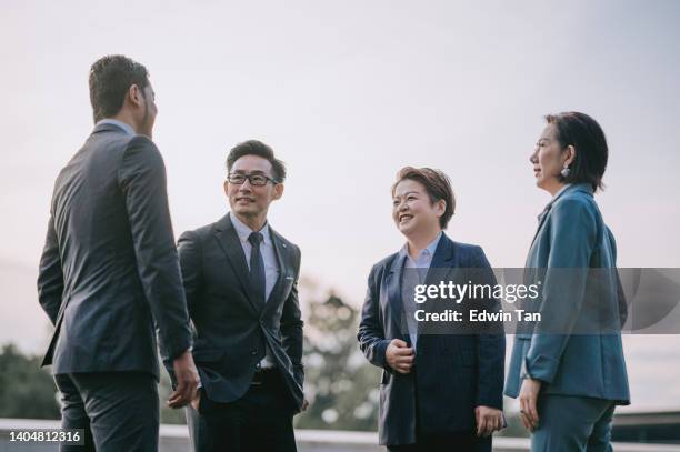 asian chinese group of business person discussion at outdoor - corporate gender equality stock pictures, royalty-free photos & images