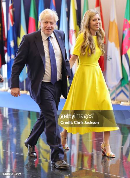 Prime Minister Boris Johnson and his wife Carrie Johnson attend the CHOGM opening ceremony at Kigali Convention Centre on June 24, 2022 in Kigali,...